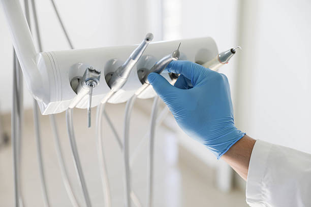 Professional Tooth Extraction technician working in Solon, IA
